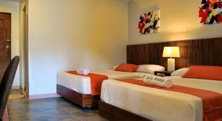 Bed in Batis Aramin Resort And Hotel Corp.