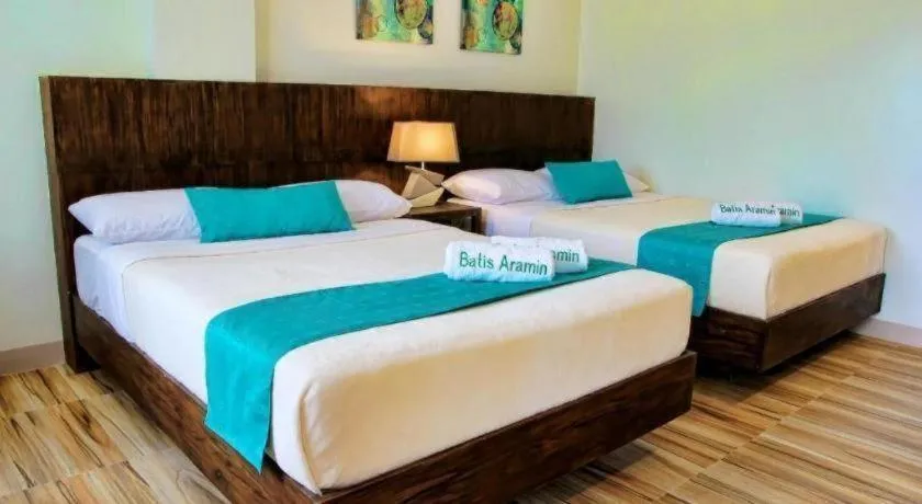 Bed in Batis Aramin Resort And Hotel Corp.