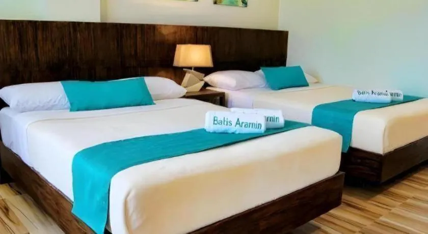 Bed in Batis Aramin Resort And Hotel Corp.