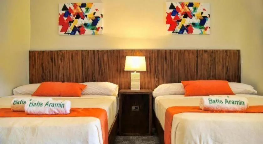 Bed in Batis Aramin Resort And Hotel Corp.