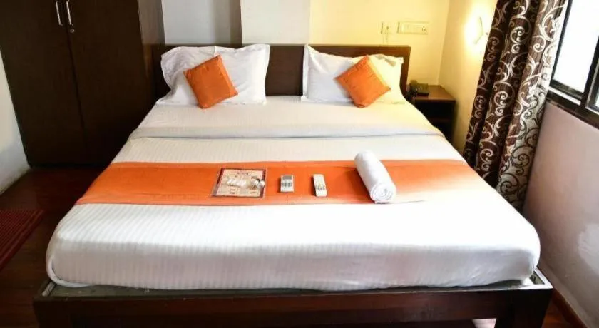 Bed in Hotel Laxmi Villa Palace