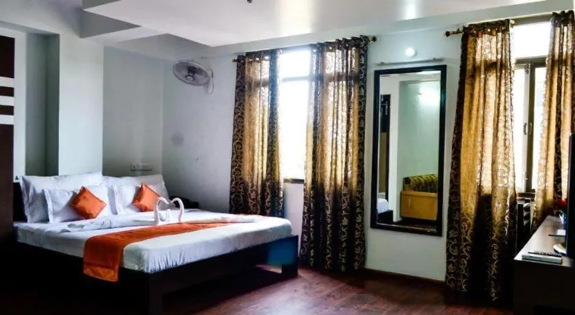 Bed in Hotel Laxmi Villa Palace