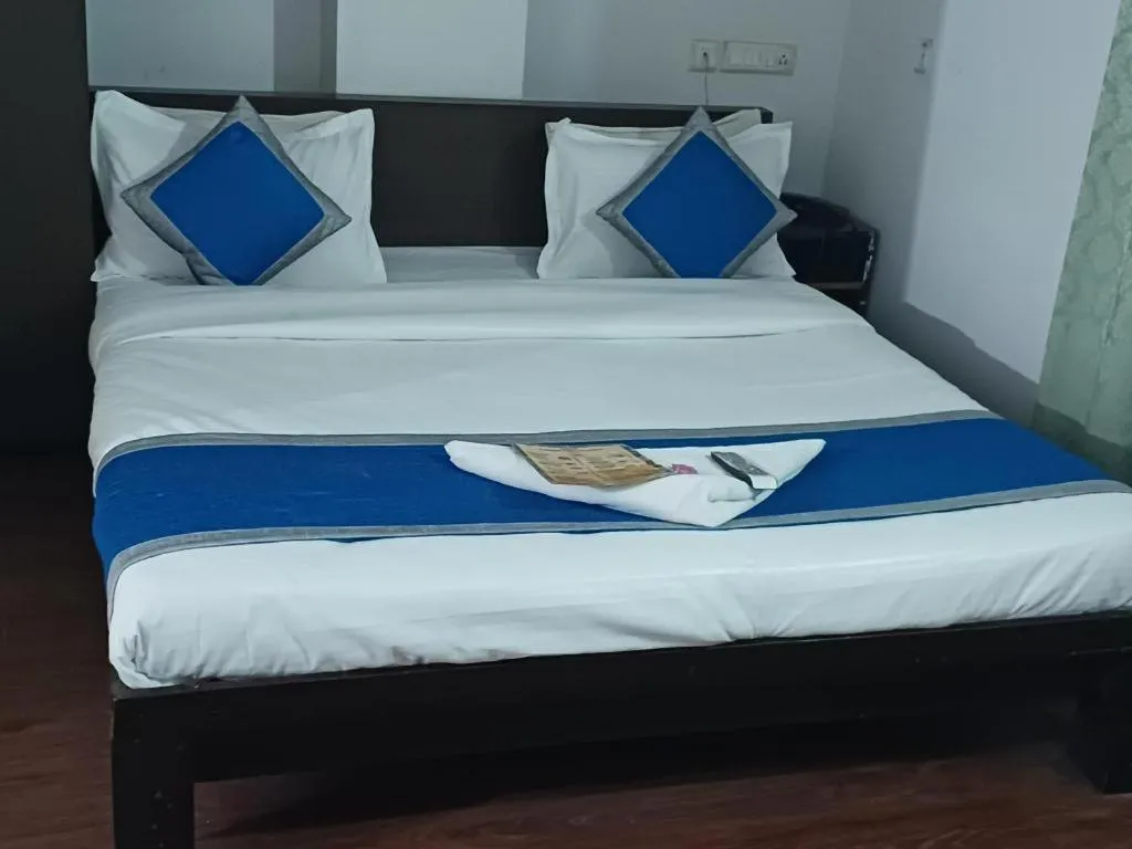 Bed in Hotel Laxmi Villa Palace