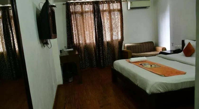 Bed in Hotel Laxmi Villa Palace