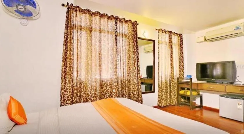 Bed in Hotel Laxmi Villa Palace