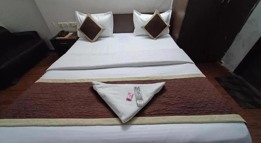 Bed in Hotel Laxmi Villa Palace