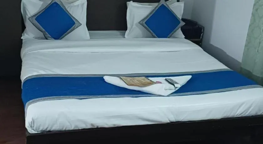 Bed in Hotel Laxmi Villa Palace