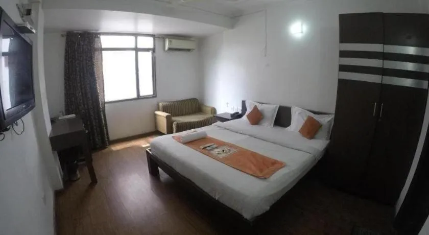 Bed in Hotel Laxmi Villa Palace