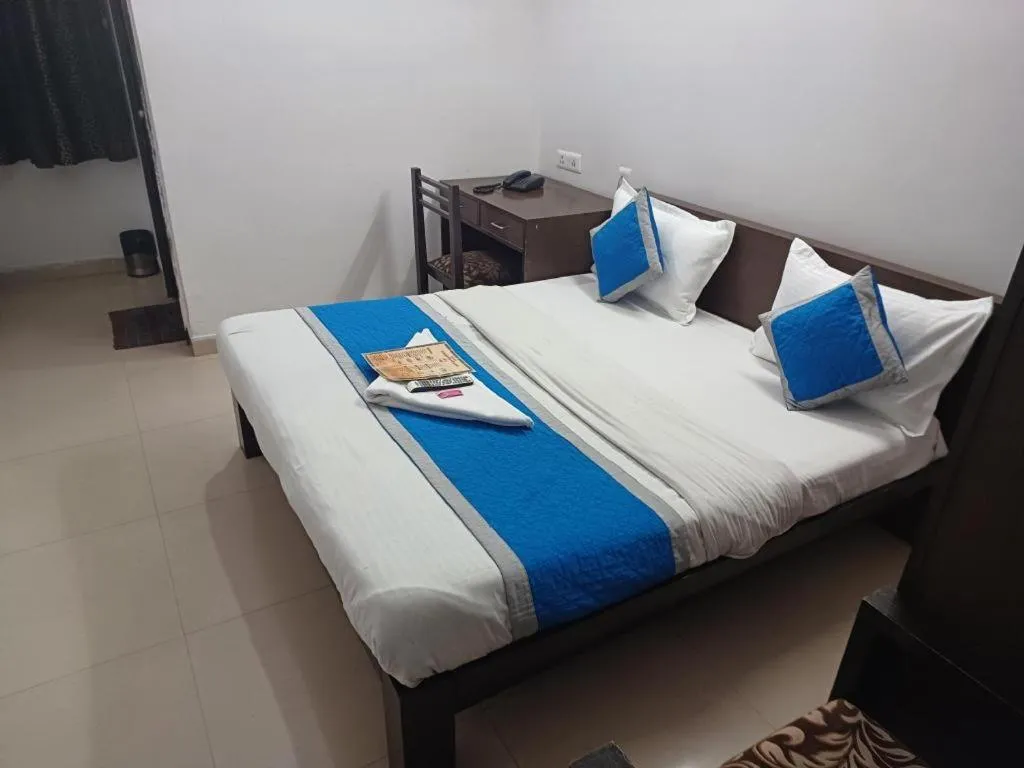 Bed in Hotel Laxmi Villa Palace