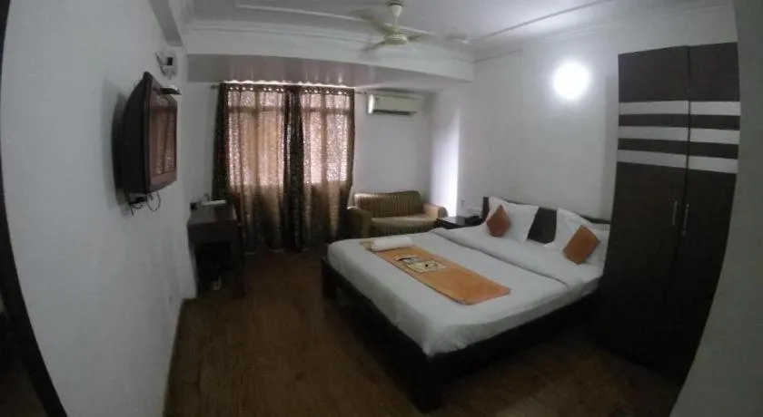 Bed in Hotel Laxmi Villa Palace