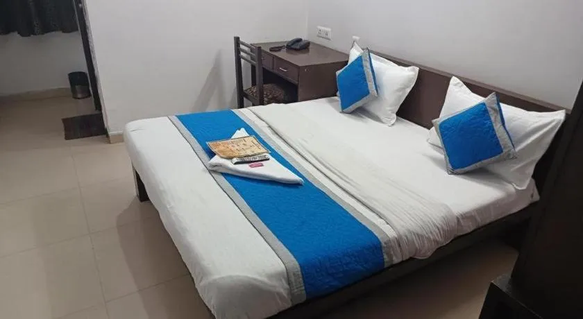 Bed in Hotel Laxmi Villa Palace