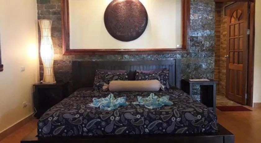 Bed in Treasure Island Beach Bungalows