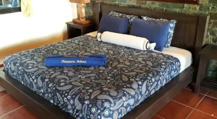 Bed in Treasure Island Beach Bungalows