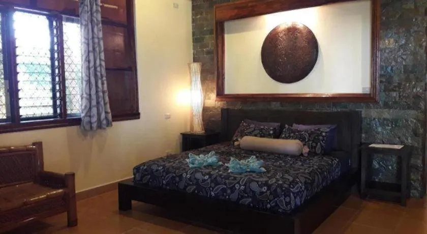 Bed in Treasure Island Beach Bungalows