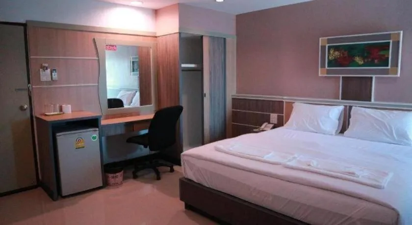 Bed in Phetlada Pavilion & Resort