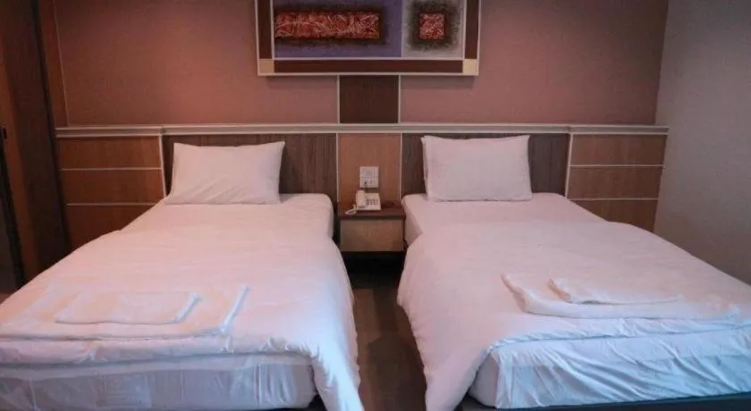 Bed in Phetlada Pavilion & Resort