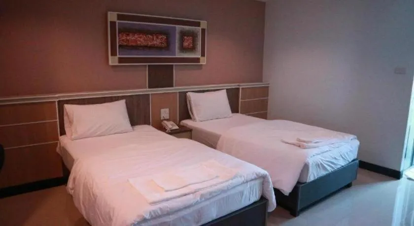 Bed in Phetlada Pavilion & Resort