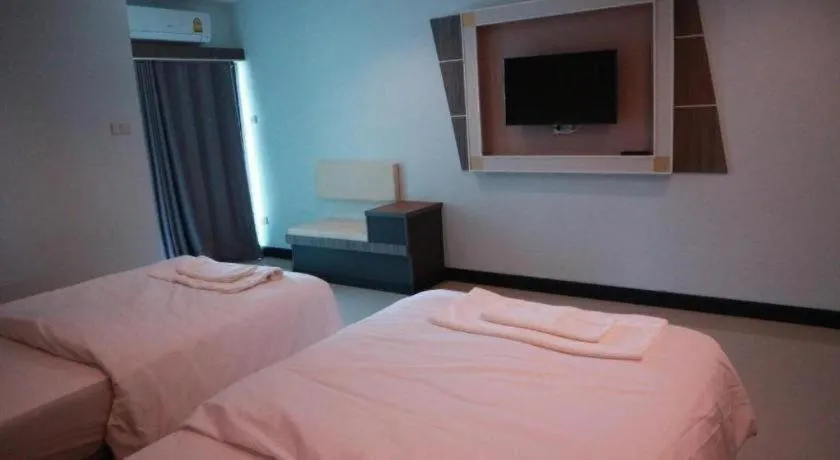 Bed in Phetlada Pavilion & Resort