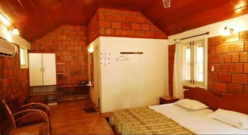 Bed in Devbagh beach resort - Junglelodges