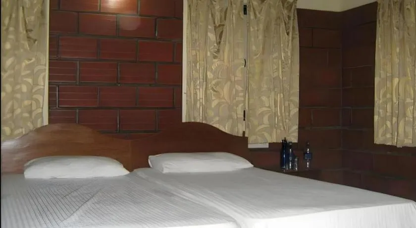 Bed in Devbagh beach resort - Junglelodges