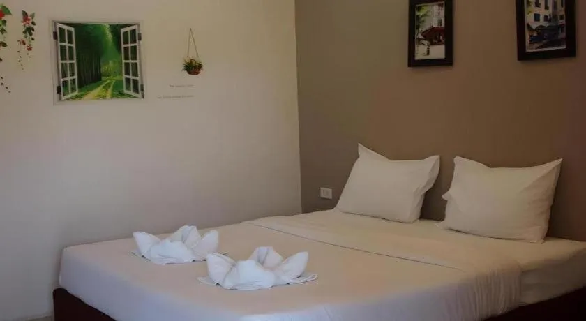 Bed in Surintara Resort