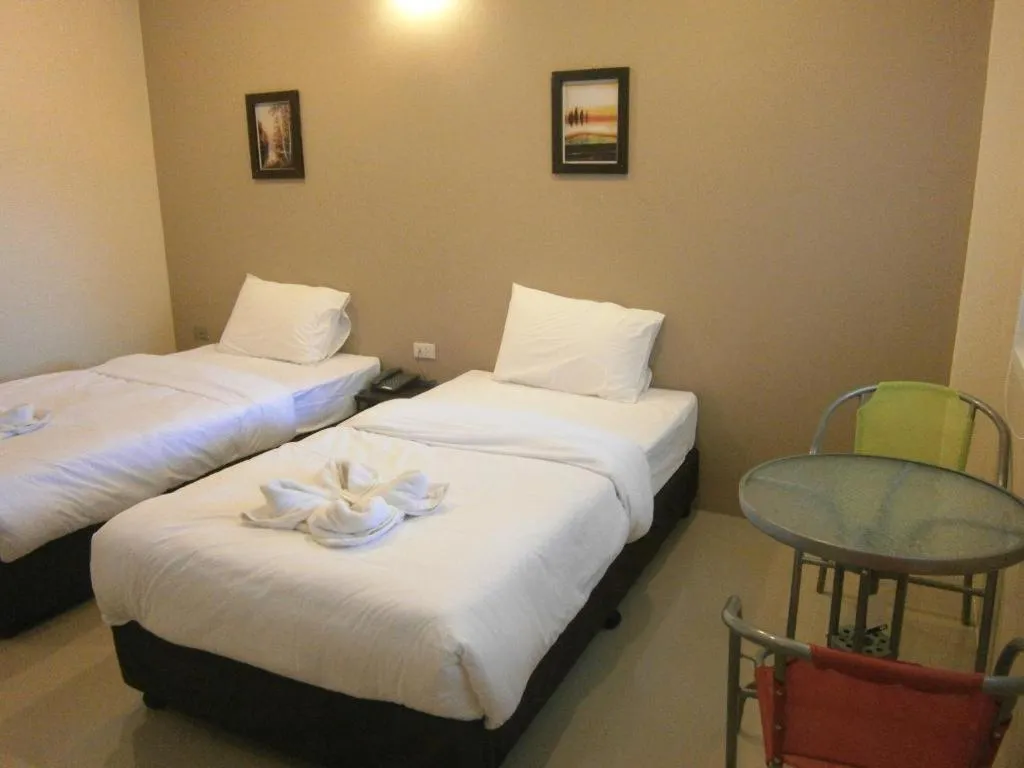 Bed in Surintara Resort