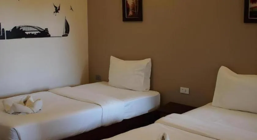 Bed in Surintara Resort