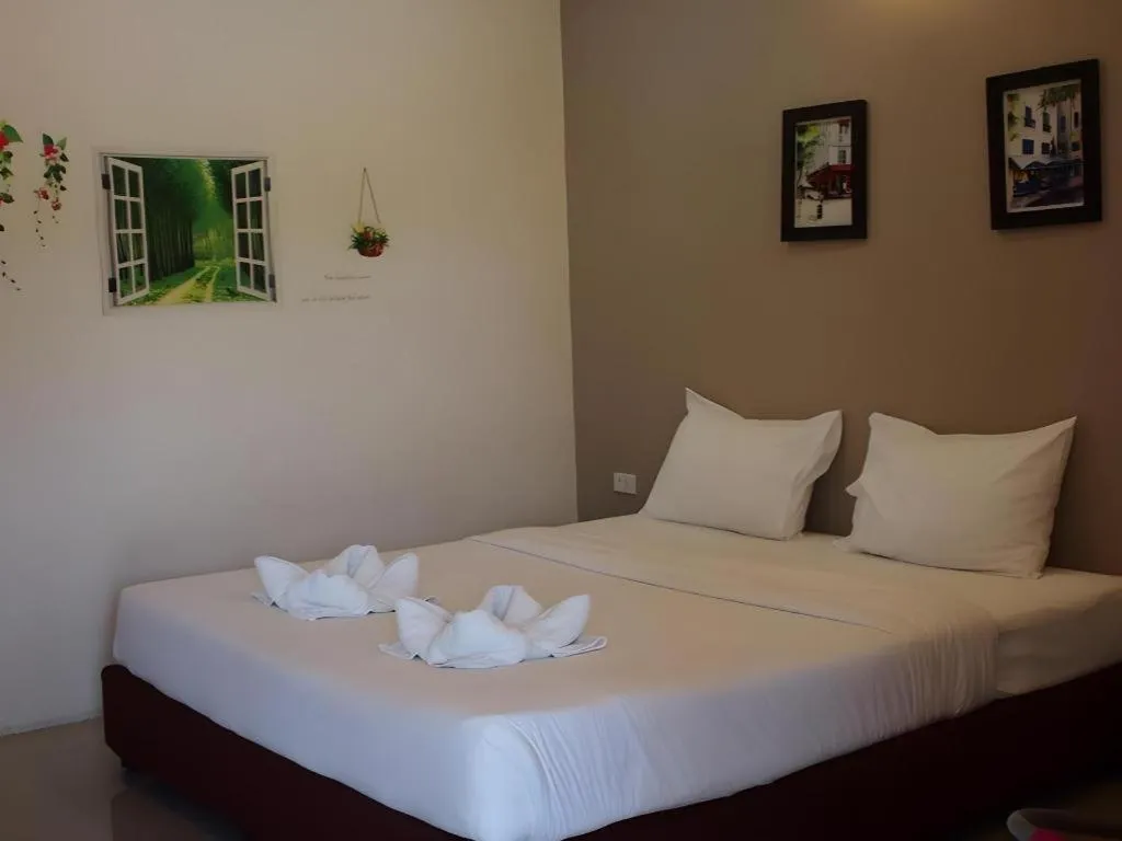 Bed in Surintara Resort