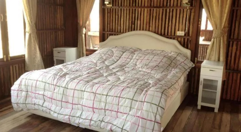 Bed in Maan Mek Talay Mok Resort