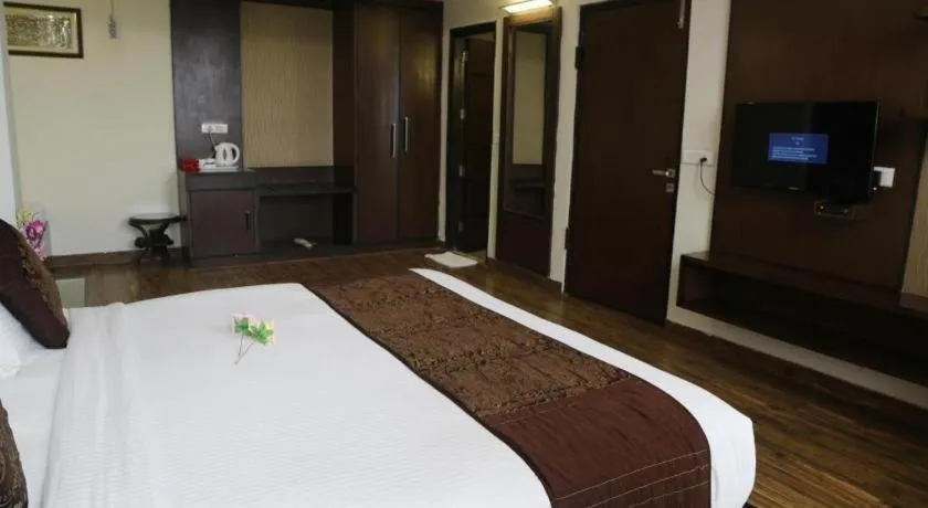 Bed in The Pearl Grand Hotel