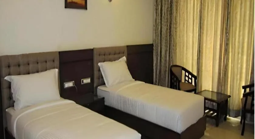 Bed in The Pearl Grand Hotel