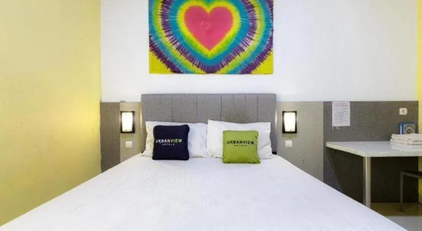 Bed in Urbanview Hotel Delima 101 Syariah