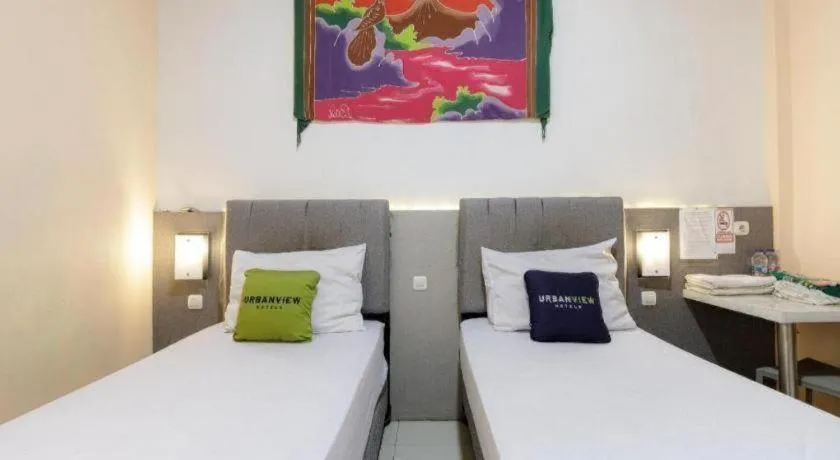 Bed in Urbanview Hotel Delima 101 Syariah