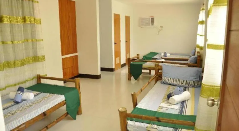 Bed in Paseo Verde Beach Resort