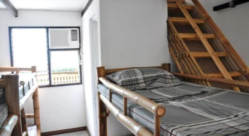 Bed in Paseo Verde Beach Resort