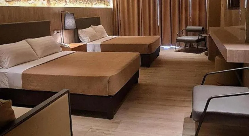 Bed in Baguio Palace Hotel