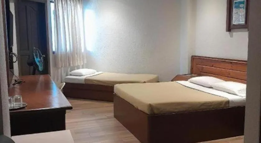 Bed in Baguio Palace Hotel