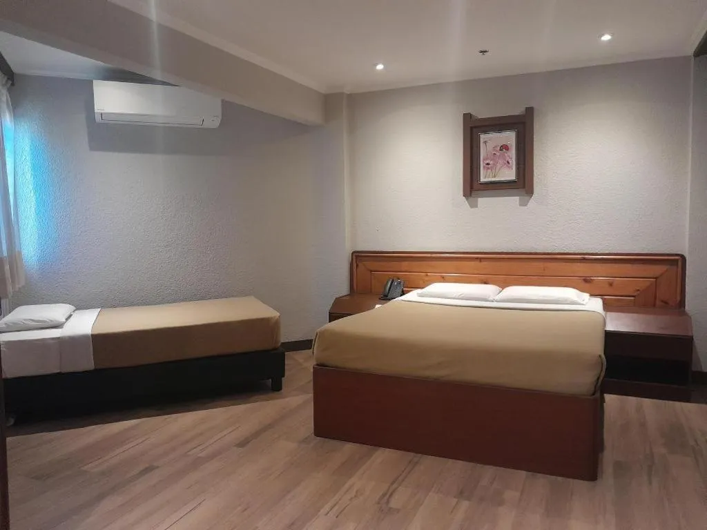 Bed in Baguio Palace Hotel