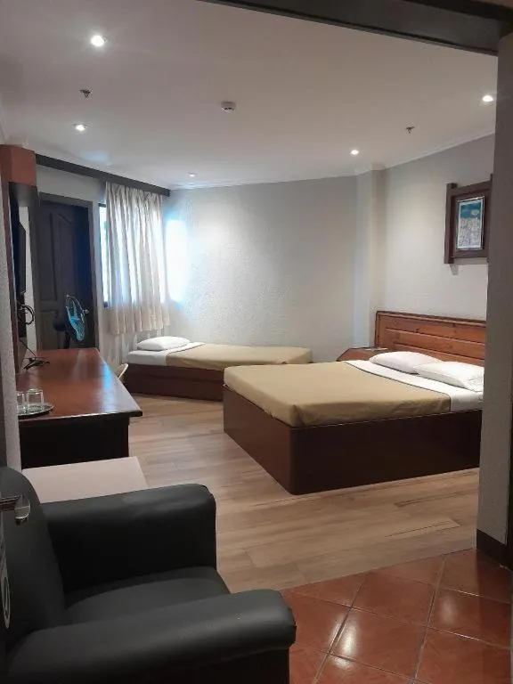 Bed in Baguio Palace Hotel