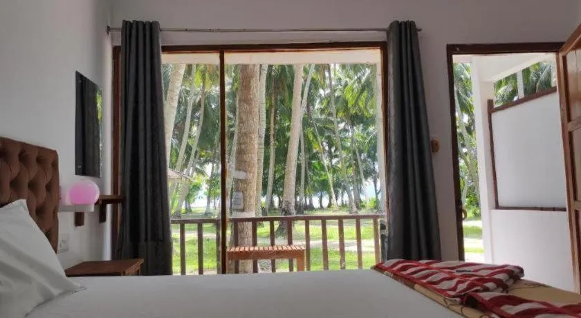 Bed in Sea View Beach Resort