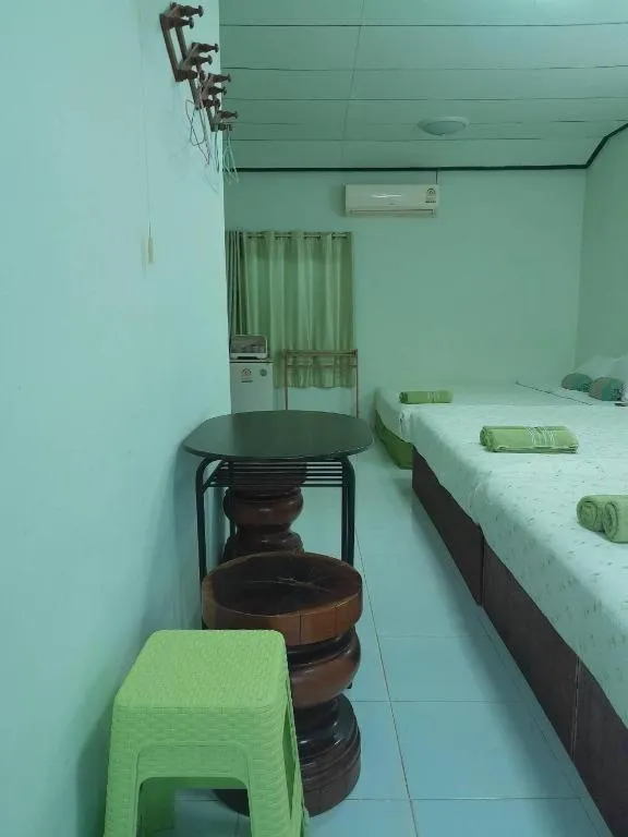Bed in Chiangkhan Greenview Resort
