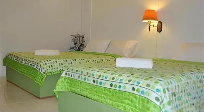Bed in Chiangkhan Greenview Resort