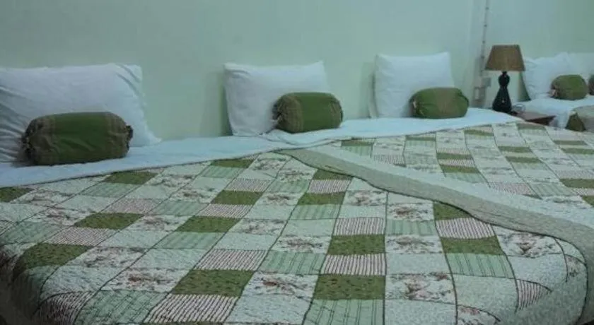 Bed in Chiangkhan Greenview Resort
