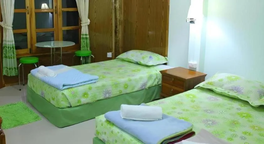 Bed in Chiangkhan Greenview Resort