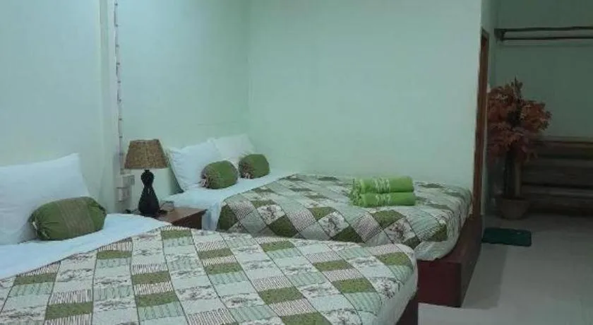 Bed in Chiangkhan Greenview Resort