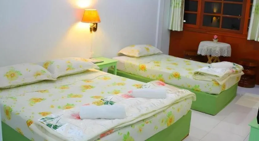 Bed in Chiangkhan Greenview Resort