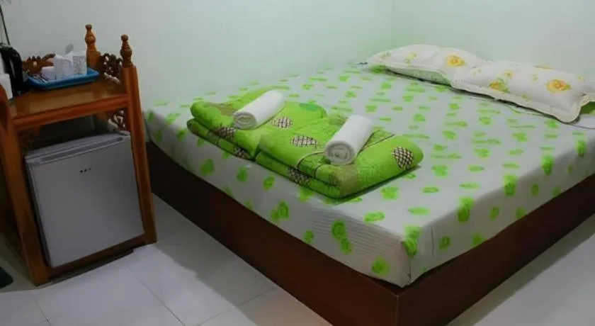 Bed in Chiangkhan Greenview Resort