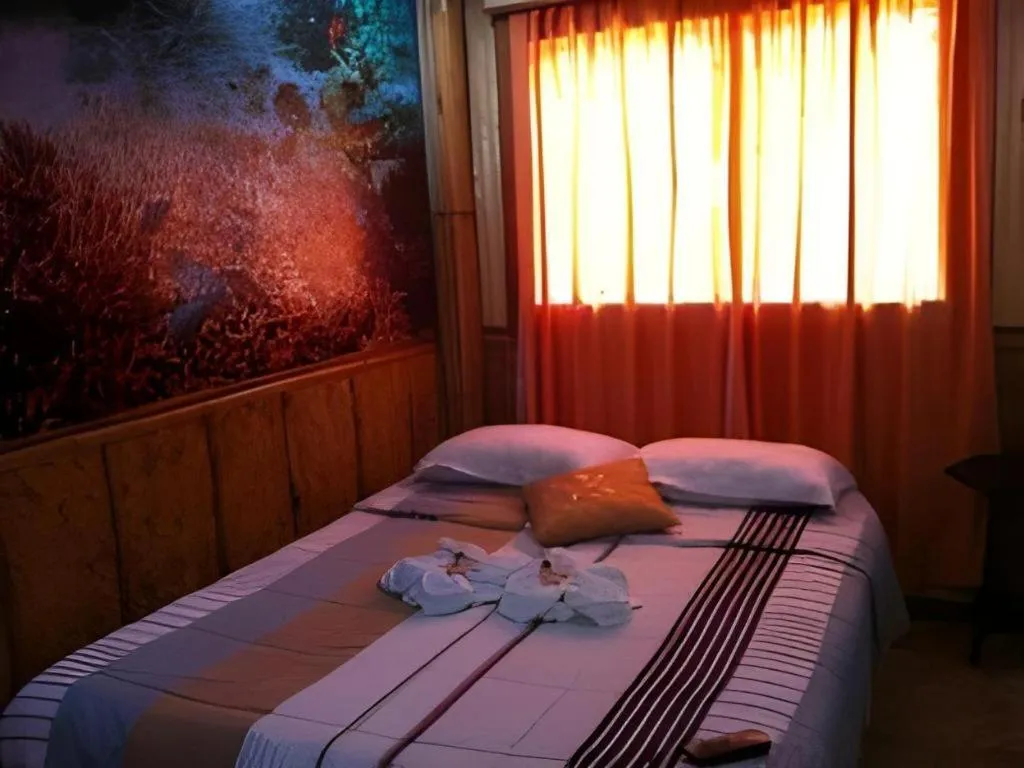 Bed in Anahaw Island View Resort
