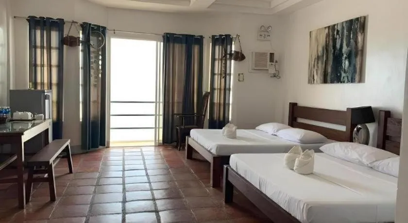 Bed in Blue Ocean Bohol Beachfront