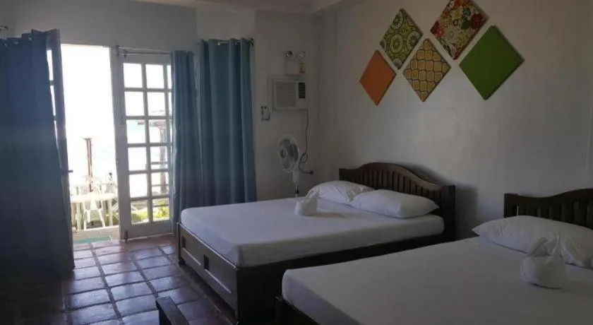 Bed in Blue Ocean Bohol Beachfront